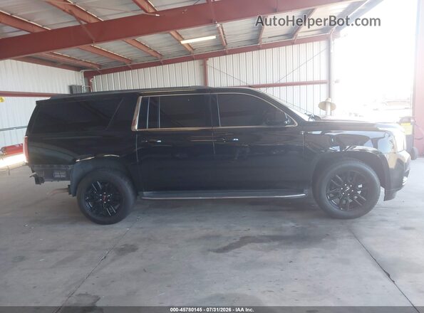 1GKS1GKC7JR333481 2018 GMC YUKON Black Widok wnętrza z tyłu