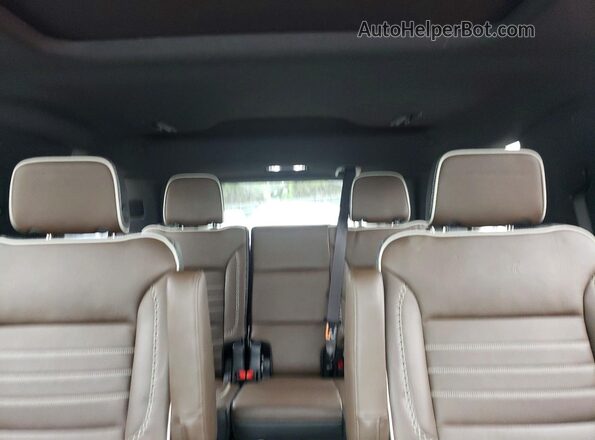 1GKS2ERL7SR133855 2025 GMC YUKON White Widok tylnych siedzeń