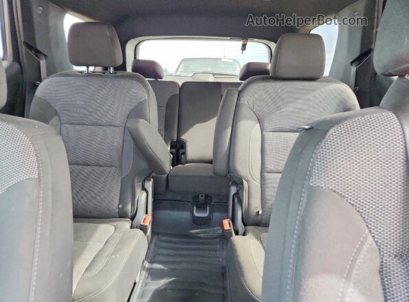1GNERGKW7PJ274099 2023 CHEVROLET TRAVERSE Red Rear seats view