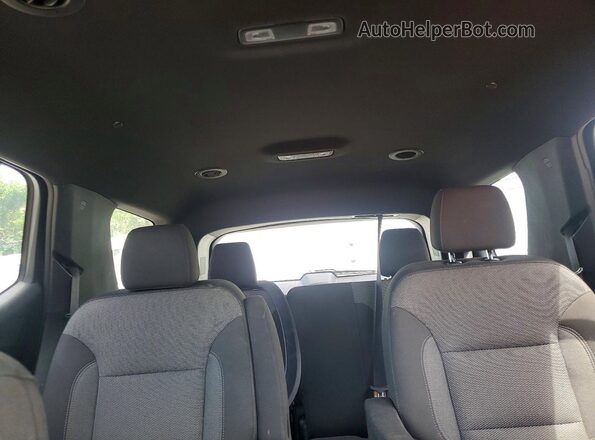 1GNERGKWXPJ128215 2023 CHEVROLET TRAVERSE Red Vista de los asientos traseros