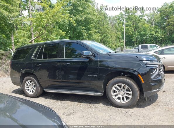 1GNS6NKDXTR266489 2026 CHEVROLET TAHOE Black Widok wnętrza z tyłu