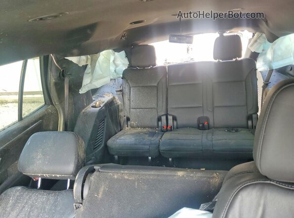 1GNS6NRD1SR210574 2025 CHEVROLET TAHOE Gray Widok tylnych siedzeń