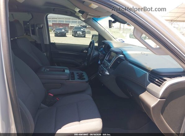 1GNSCAEC1KR101787 2019 CHEVROLET TAHOE Silver Widok wnętrza z przodu