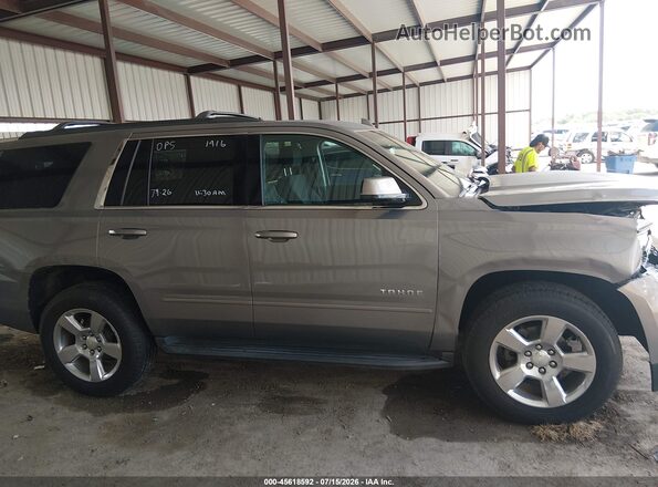1GNSCAKC1HR322822 2017 CHEVROLET TAHOE Золотой Вид задней части салона