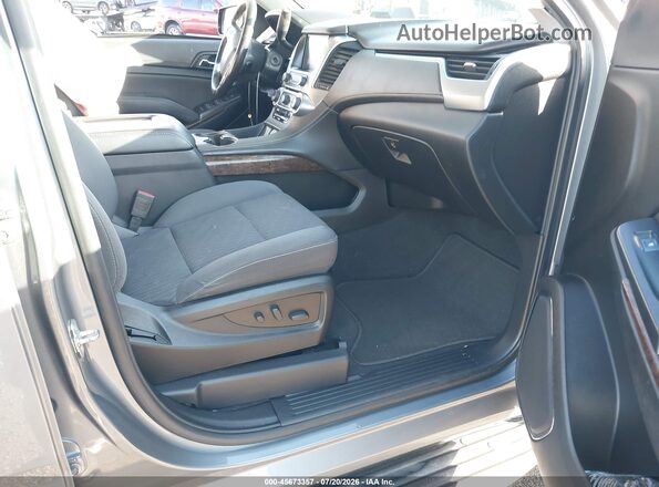 1GNSCAKC8LR194927 2020 CHEVROLET TAHOE Gray წინა სალონის ხედი