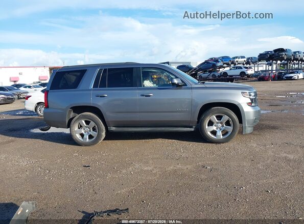 1GNSCAKC8LR194927 2020 CHEVROLET TAHOE Gray უკანა სალონის ხედი