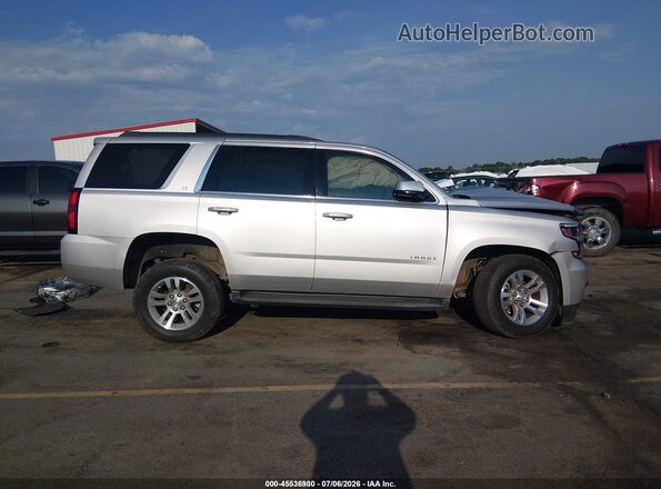 1GNSCBKC0JR255111 2018 CHEVROLET TAHOE Silver Widok wnętrza z tyłu