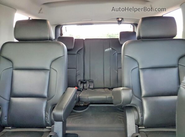 1GNSCBKC2JR365769 2018 CHEVROLET TAHOE White Vista de los asientos traseros