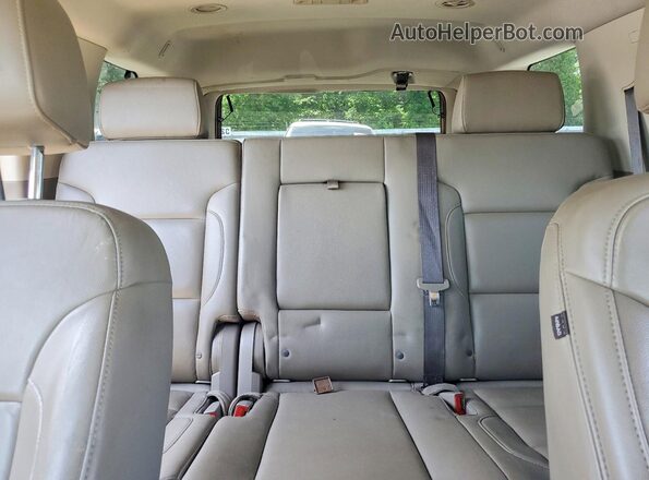 1GNSCBKC3JR238657 2018 CHEVROLET TAHOE Black Vista de los asientos traseros