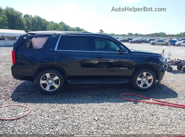 1GNSCBKC4HR109983 2017 CHEVROLET TAHOE Black Widok wnętrza z tyłu