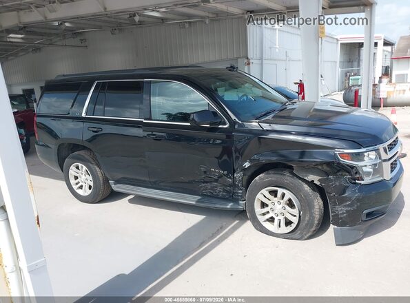 1GNSCBKC7LR309278 2020 CHEVROLET TAHOE Черный Вид задней части салона