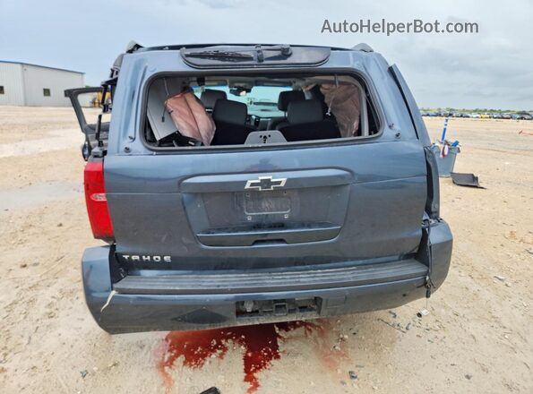 1GNSCBKCXKR164364 2019 CHEVROLET TAHOE Синий Вид сзади