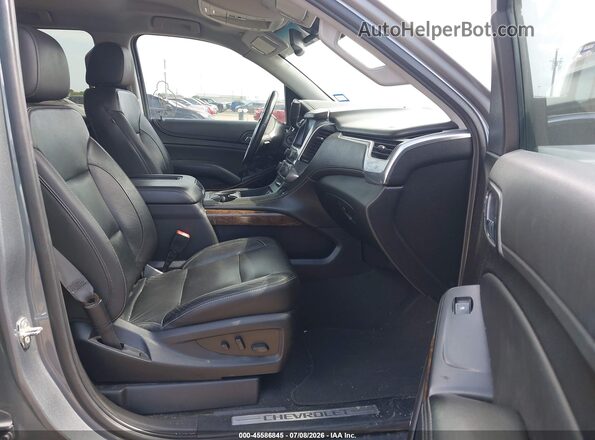1GNSCBKCXKR373328 2019 CHEVROLET TAHOE Серый Вид салона спереди