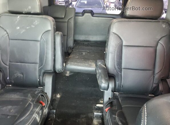 1GNSCCKC4HR112002 2017 CHEVROLET TAHOE Silver Rear seats view
