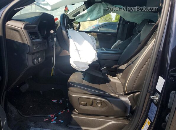1GNSCFKD6PR476544 2023 CHEVROLET SUBURBAN Black Front interior view