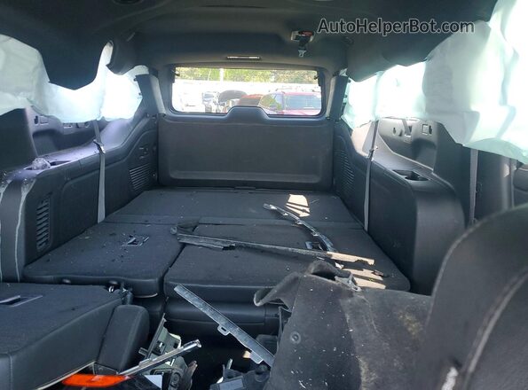 1GNSCFKD6PR476544 2023 CHEVROLET SUBURBAN Black Rear seats view