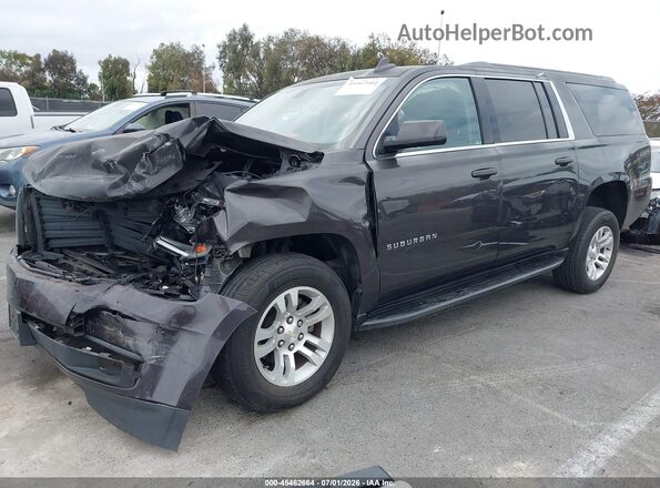 1GNSCGKC1HR295477 2017 CHEVROLET SUBURBAN Gray Vista tres cuartos delantera izquierda