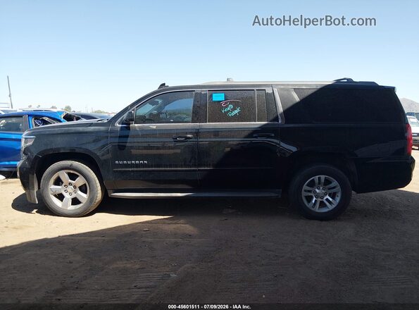 1GNSCGKC2HR171587 2017 CHEVROLET SUBURBAN Черный Вид задней части салона