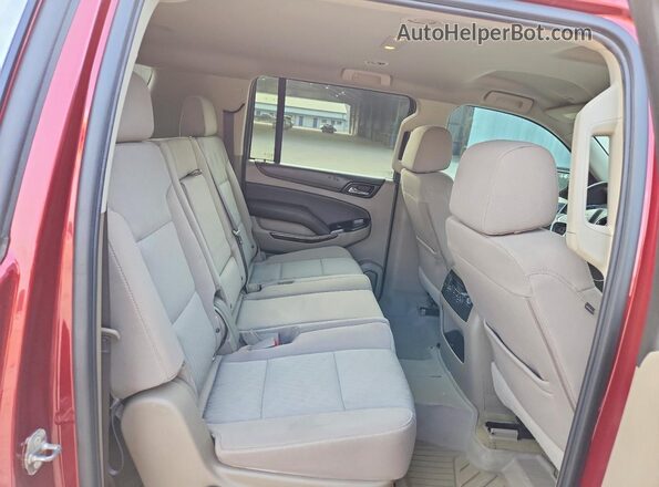 1GNSCGKC7JR301692 2018 CHEVROLET SUBURBAN Maroon Вид задньої частини салону