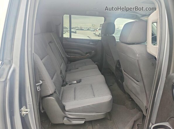 1GNSCGKC9JR187890 2018 CHEVROLET SUBURBAN Gray Rear interior view