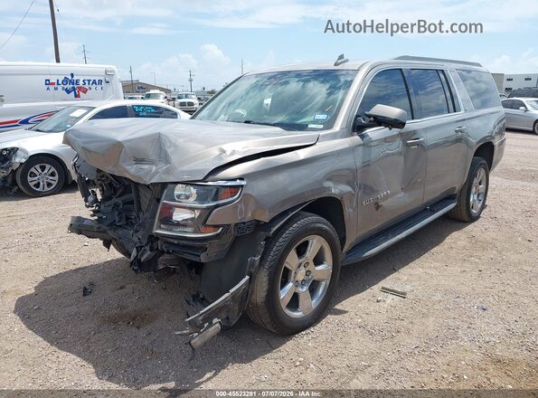 1GNSCHKC1JR398829 2018 CHEVROLET SUBURBAN Gray Vista tres cuartos delantera izquierda