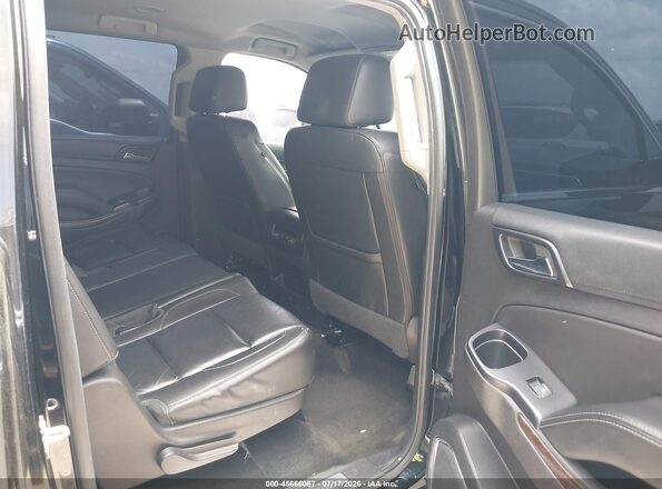1GNSCHKC7JR106715 2018 CHEVROLET SUBURBAN Black VIN կոդի պիտակի տեսք