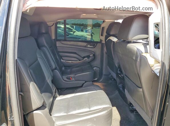 1GNSCHKC9GR475018 2016 CHEVROLET SUBURBAN Black უკანა სალონის ხედი