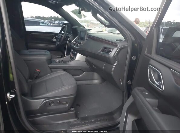 1GNSCMKD4PR516687 2023 CHEVROLET TAHOE Черный Вид салона спереди