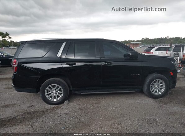1GNSCMKD4PR516687 2023 CHEVROLET TAHOE Черный Вид задней части салона