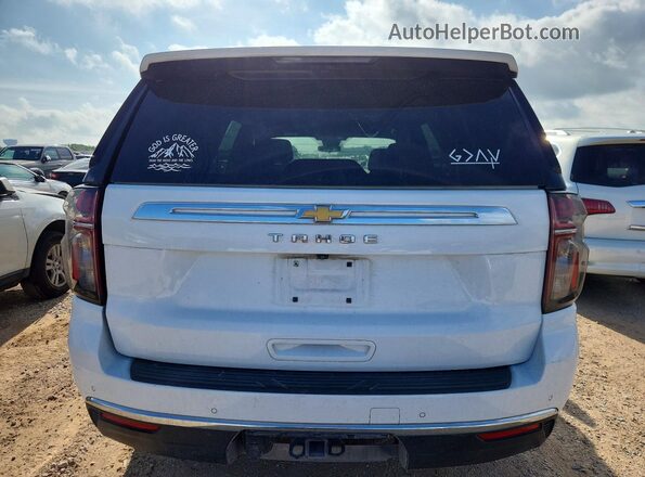 1GNSCMKD7PR112007 2023 CHEVROLET TAHOE White Вид ззаду