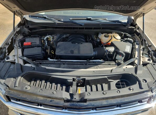 1GNSCNKD0MR410609 2021 CHEVROLET TAHOE Gold Vista del compartimento del motor