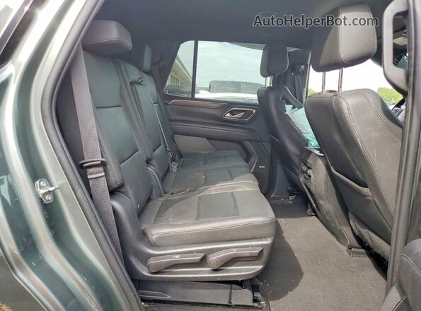 1GNSCNKD4PR307696 2023 CHEVROLET TAHOE Green Widok wnętrza z tyłu