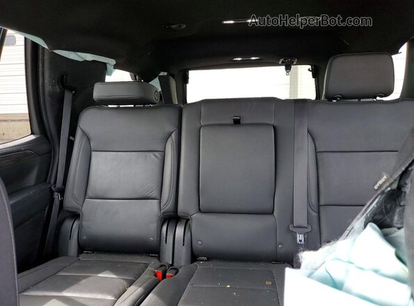 1GNSCNKD4PR307696 2023 CHEVROLET TAHOE Green Widok tylnych siedzeń