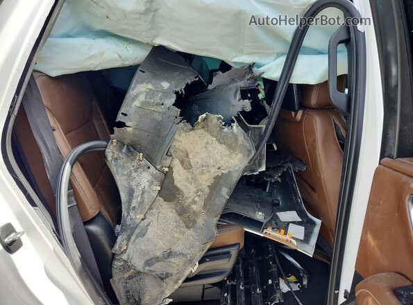 1GNSCTKL1MR101498 2021 CHEVROLET TAHOE White Widok wnętrza z tyłu