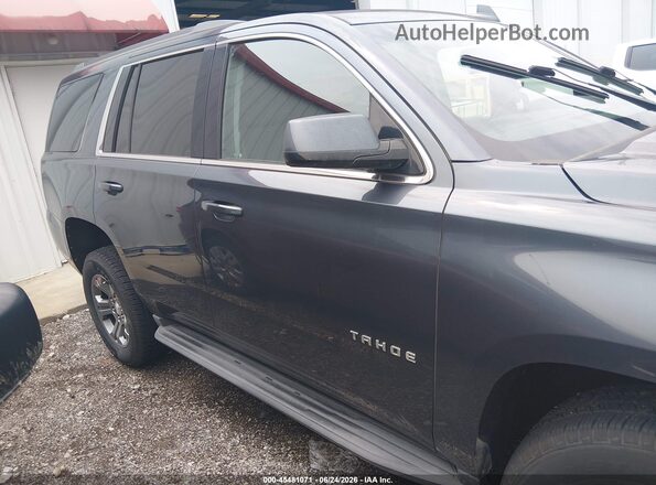 1GNSKAEC1LR106895 2020 CHEVROLET TAHOE Gray Rear interior view