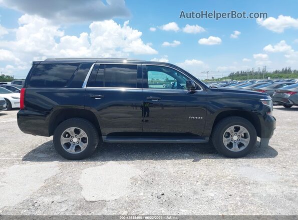 1GNSKAEC3KR102720 2019 CHEVROLET TAHOE Black Vista interior trasera
