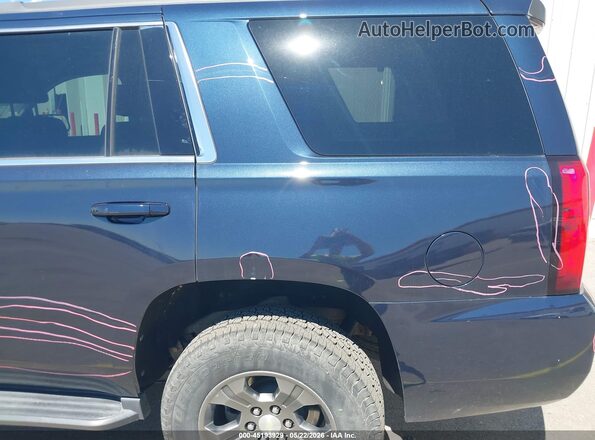 1GNSKAEC5JR317630 2018 CHEVROLET TAHOE Dark Blue Rear interior view
