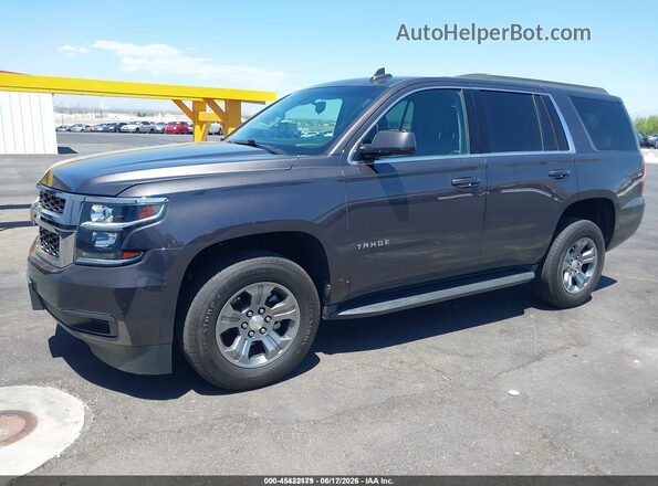 1GNSKAEC6JR331102 2018 CHEVROLET TAHOE Серый Вид щитка приборов