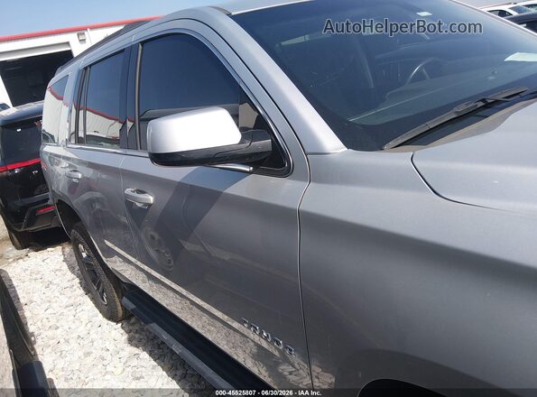 1GNSKAEC7LR119148 2020 CHEVROLET TAHOE Серебряный Вид задней части салона
