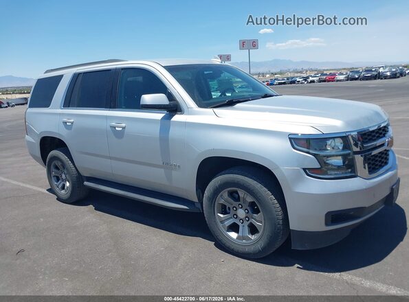 1GNSKAEC8JR287135 2018 CHEVROLET TAHOE Silver Սալոնի հետևի տեսք