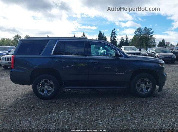1GNSKAEC8LR119482 2020 CHEVROLET TAHOE Blue Widok wnętrza z tyłu