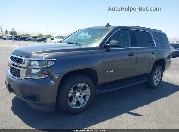 1GNSKAEC9JR329313 2018 CHEVROLET TAHOE Серый Вид щитка приборов