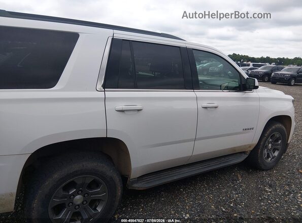 1GNSKAEC9LR105865 2020 CHEVROLET TAHOE White Widok wnętrza z tyłu