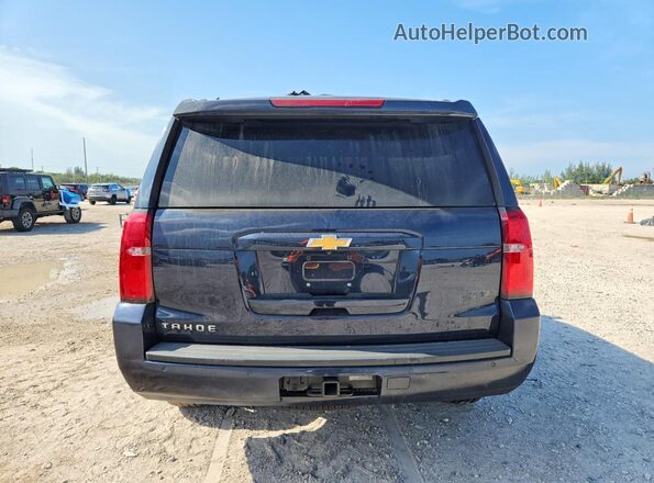 1GNSKAEC9LR120799 2020 CHEVROLET TAHOE Blue Вид ззаду