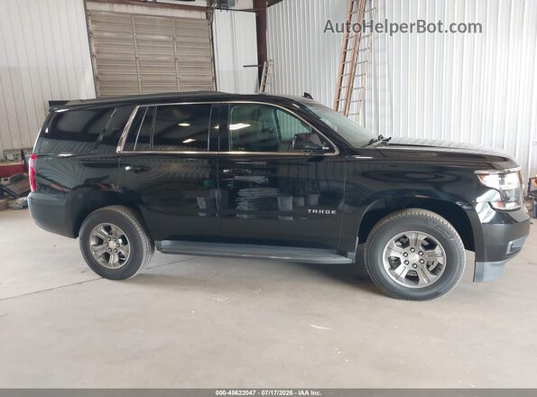 1GNSKAECXJR297746 2018 CHEVROLET TAHOE Black უკანა სალონის ხედი