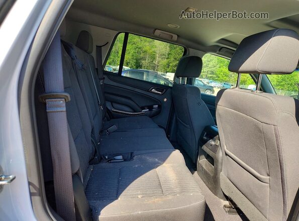 1GNSKAKC7LR130378 2020 CHEVROLET TAHOE Белый Вид задней части салона