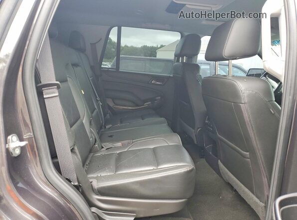1GNSKBKC2JR136902 2018 CHEVROLET TAHOE Серый Вид задней части салона