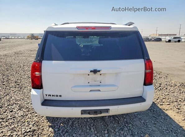 1GNSKBKC2KR240100 2019 CHEVROLET TAHOE Белый Вид сзади