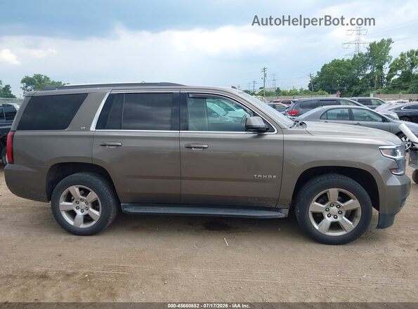 1GNSKBKC4GR107636 2016 CHEVROLET TAHOE Brown უკანა სალონის ხედი