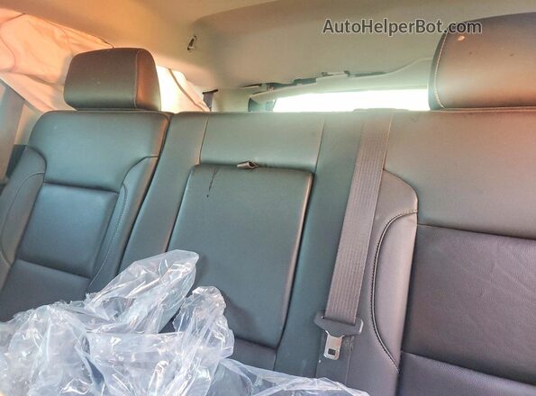 1GNSKBKC4JR306418 2018 CHEVROLET TAHOE Silver Rear seats view